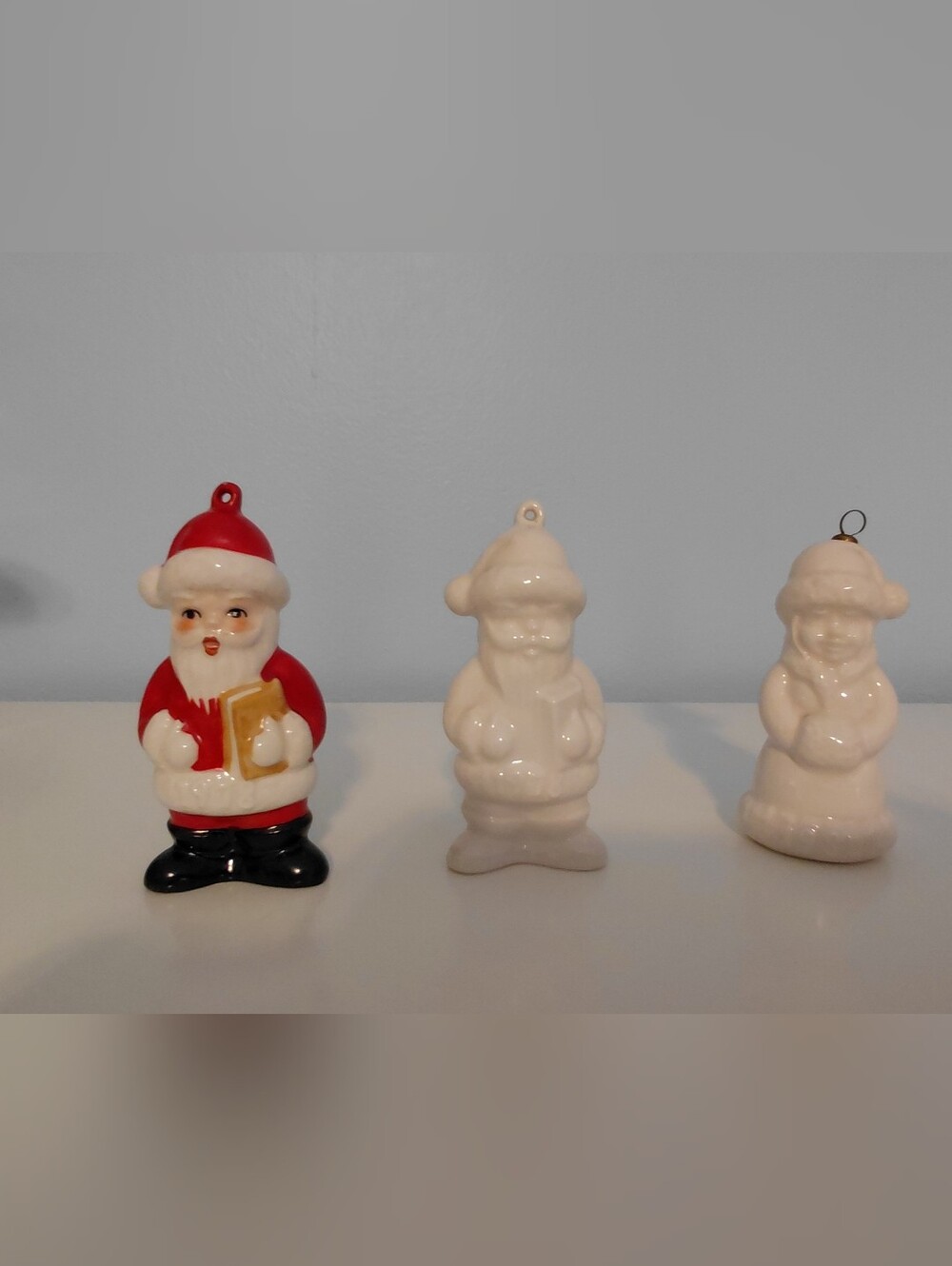 Goebel Red, White and Black Santa, White Santa and White Mrs. Claus